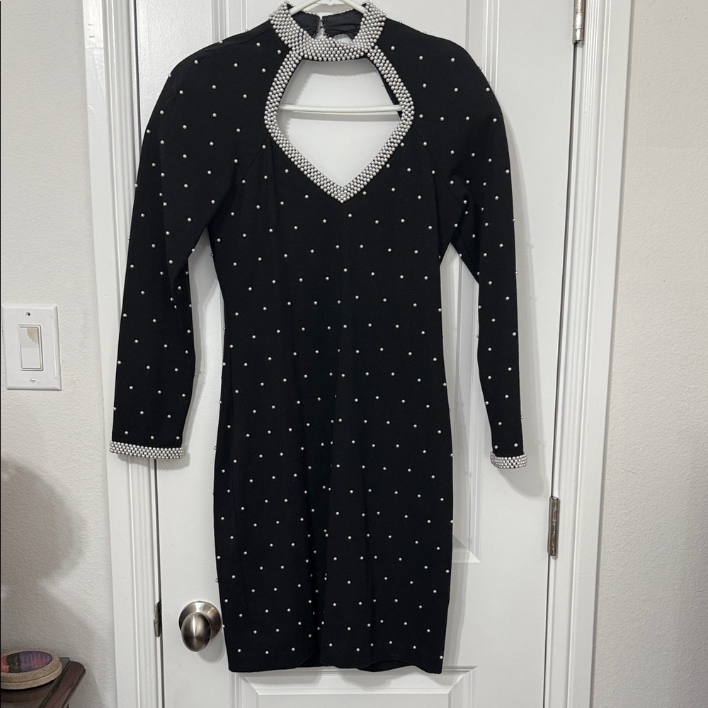 Chic Black Long Sleeve Dress with White Sewn on balls.